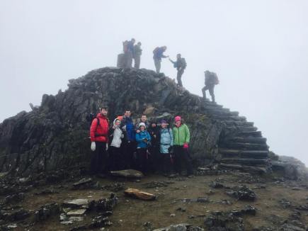 The team just below the summit Cairn of Snowdon